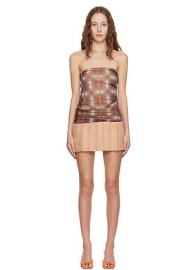 A woman wearing Sultry Virgin brown check strapless minidress