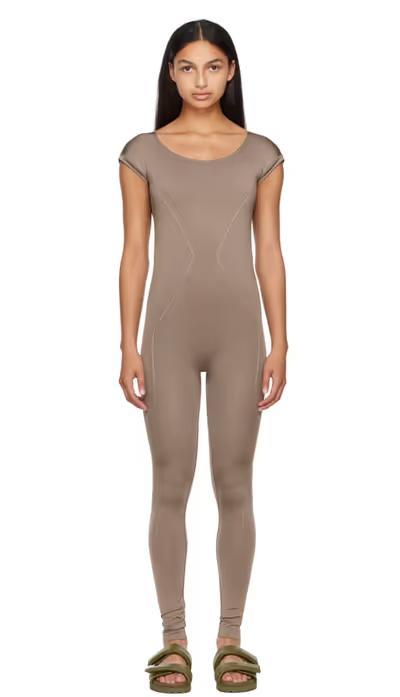 A woman wearing Prism² taupe enlightened unitard