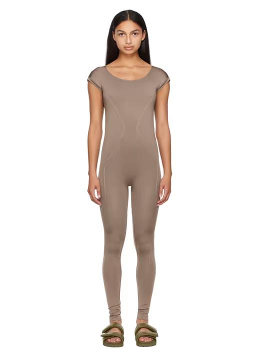 A woman wearing Prism² taupe enlightened unitard