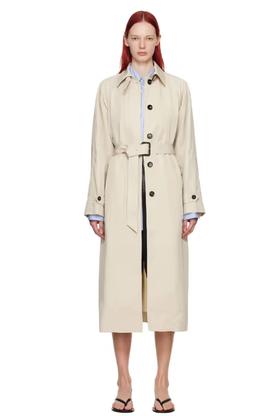A woman wearing Teurn Studios beige belted trench coat