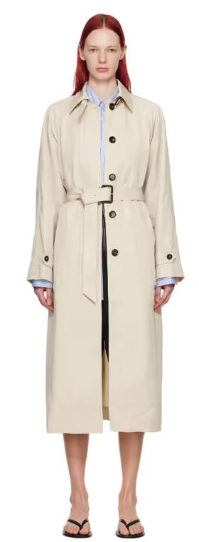 A woman wearing Teurn Studios beige belted trench coat