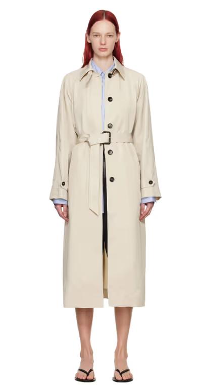 A woman wearing Teurn Studios beige belted trench coat
