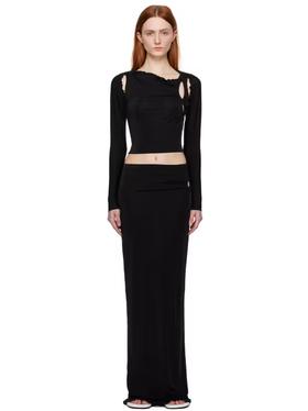 A woman wearing TYRELL ssense exclusive black camisole & midi skirt set
