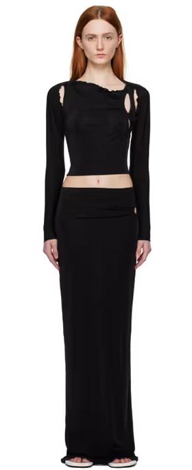 A woman wearing TYRELL ssense exclusive black camisole & midi skirt set
