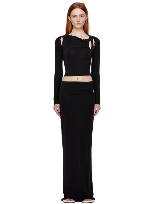 A woman wearing TYRELL ssense exclusive black camisole & midi skirt set