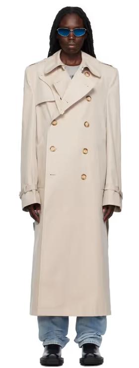 A woman wearing VTMNTS white tailored trench coat
