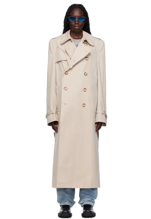 A woman wearing VTMNTS white tailored trench coat
