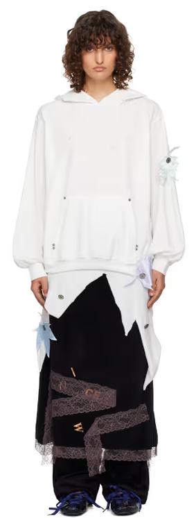 A woman wearing VeniceW white tree hoodie