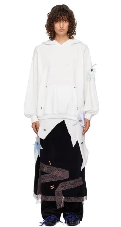 A woman wearing VeniceW white tree hoodie