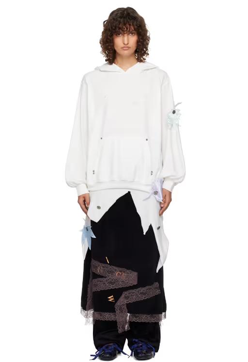 A woman wearing VeniceW white tree hoodie
