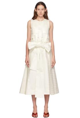 A woman wearing SUPER YAYA off-white linda beatrice midi dress