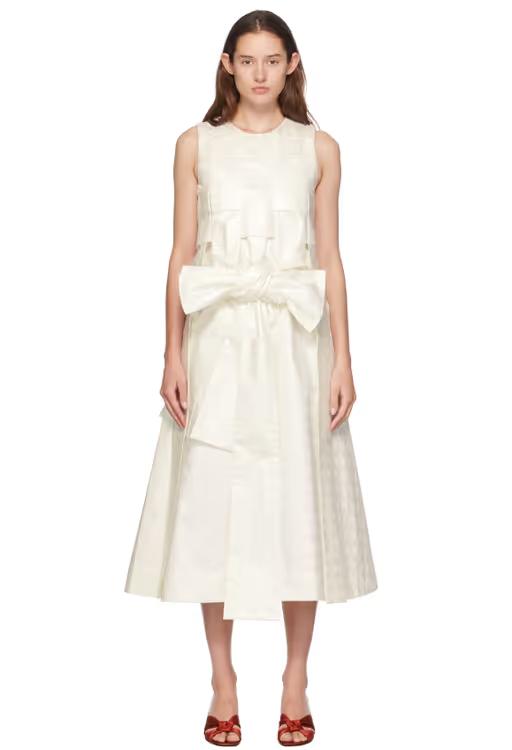 A woman wearing SUPER YAYA off-white linda beatrice midi dress