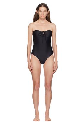 A woman wearing Yasmine Eslami black anna swimsuit