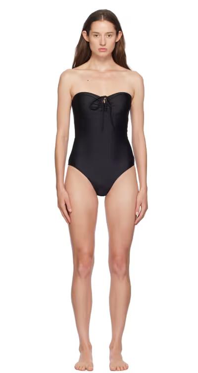 A woman wearing Yasmine Eslami black anna swimsuit