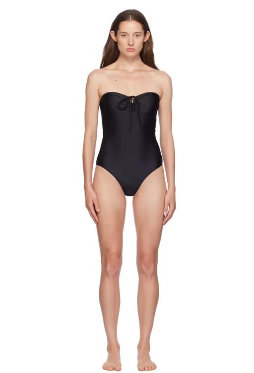 A woman wearing Yasmine Eslami black anna swimsuit