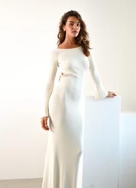 A woman wearing Yellow the Label harper maxi dress — ivory
