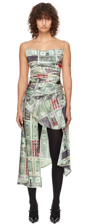A woman wearing VAQUERA green dollar print minidress