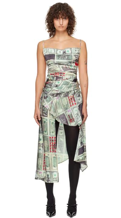 A woman wearing VAQUERA green dollar print minidress