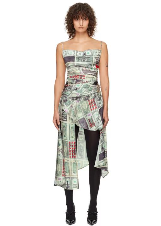 A woman wearing VAQUERA green dollar print minidress