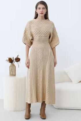 A woman wearing Chicwish artisanal charm boat neck cable knit dress