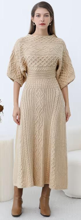 A woman wearing Chicwish artisanal charm boat neck cable knit dress