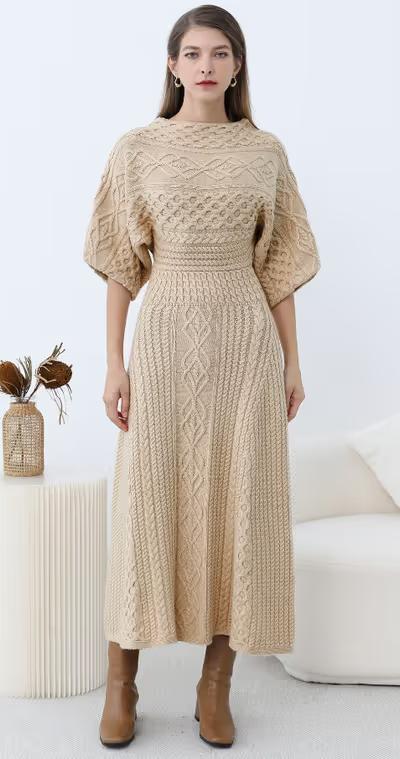 A woman wearing Chicwish artisanal charm boat neck cable knit dress