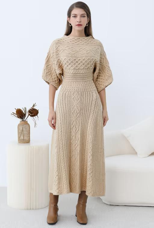 A woman wearing Chicwish artisanal charm boat neck cable knit dress