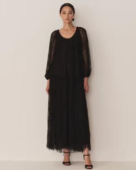 A woman wearing Doen nevaeh dress