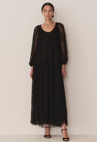 A woman wearing Doen nevaeh dress