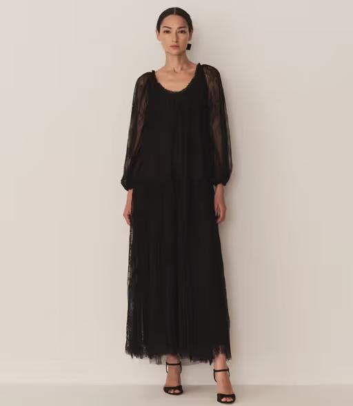A woman wearing Doen nevaeh dress