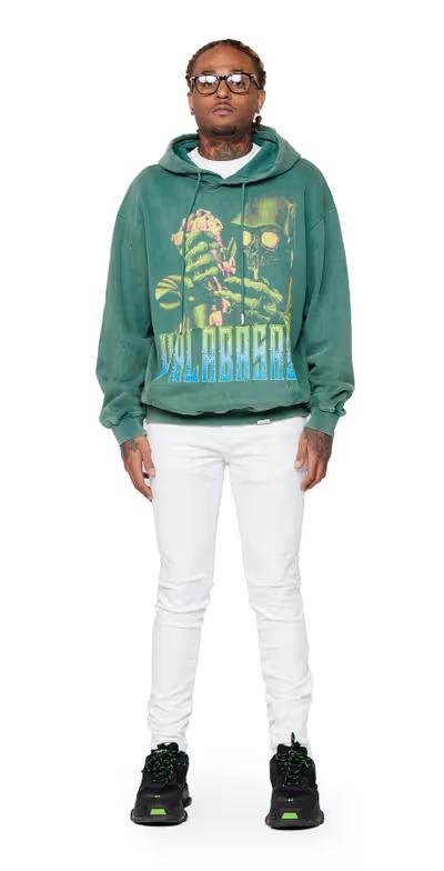 A man wearing Valabasas "Green reaper" washed field green hoodie