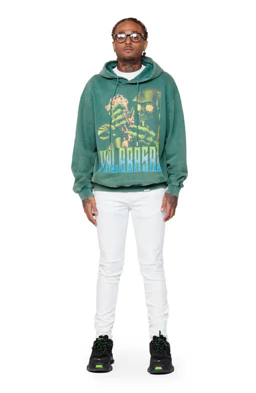 A man wearing Valabasas "Green reaper" washed field green hoodie