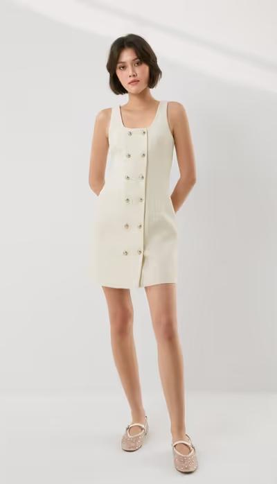 A woman wearing Pomelo Fashion tweed mini dress - cream