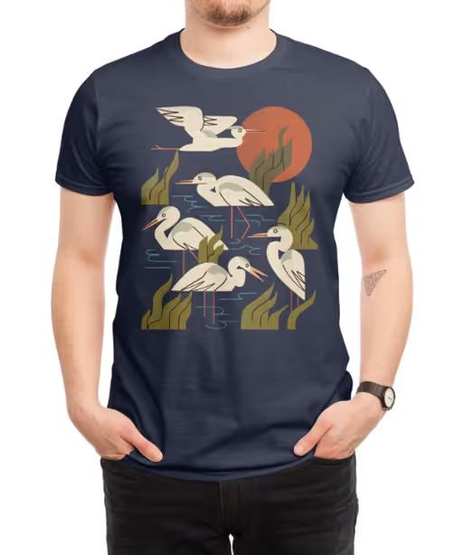 A man wearing Threadless five heron flock t-shirt