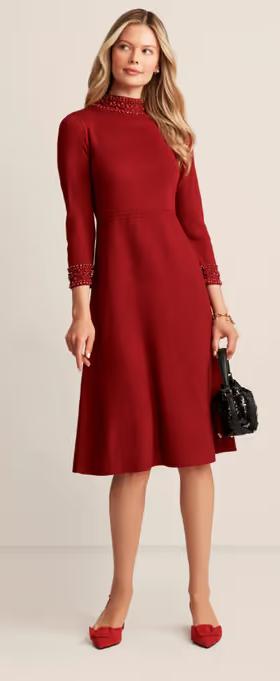 A woman wearing Anne Klein embellished mock neck dress