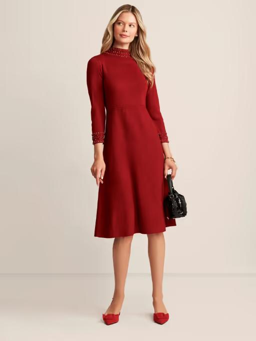A woman wearing Anne Klein embellished mock neck dress