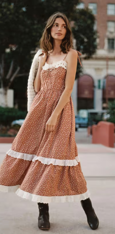 A woman wearing a Christy Dawn dress in red