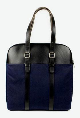 A close-up of a Billykirk Leather Laptop Bag in navy blue