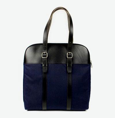 A close-up of a Billykirk Leather Laptop Bag in navy blue