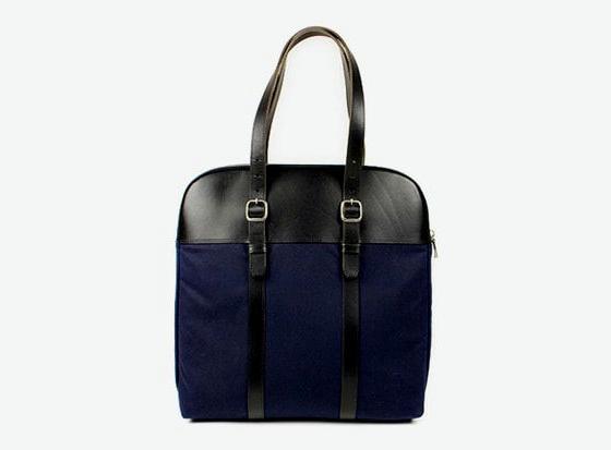 A close-up of a Billykirk Leather Laptop Bag in navy blue