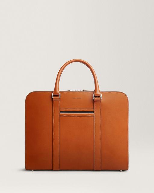 A close-up of a Carl Friedrik bag in tan