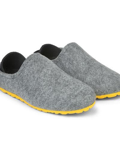 A close-up of a pair of Mahabis Slippers
