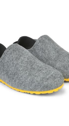 A close-up of a pair of Mahabis Slippers
