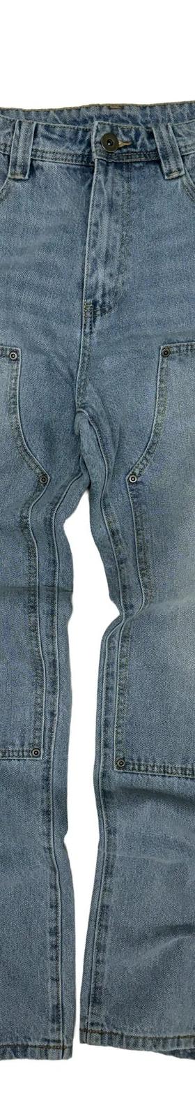 A pair of stonewashed 74isWar carpenter jeans with military patches and stenciled lettering