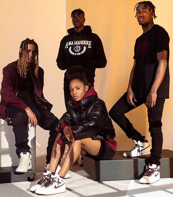 A group wearing A Ma Maniére hoodies, leather jackets and sneakers