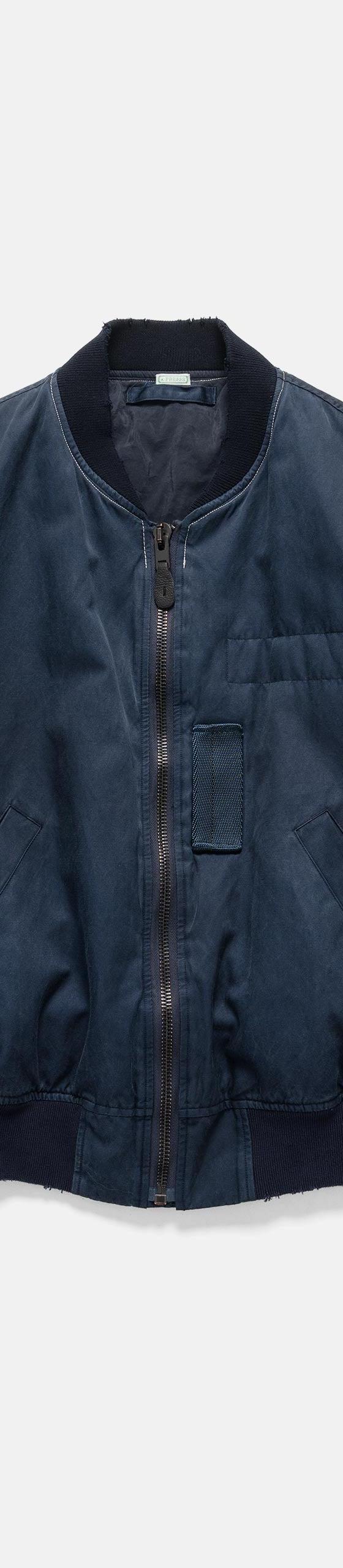 A navy A.PRESSE MA-1 style flight jacket with faded cotton shell and ribbed collar