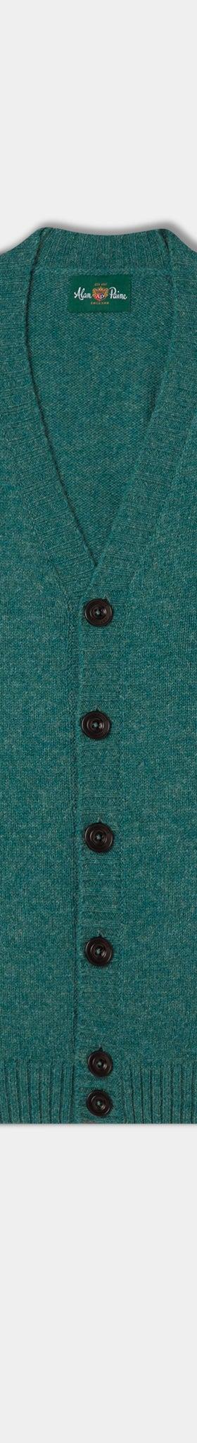 A teal green Alan Paine lambswool cardigan with V-neck and horn buttons on a plain background