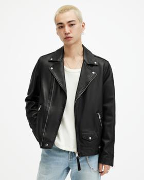 A man in a black AllSaints leather biker jacket over a white tank and light jeans