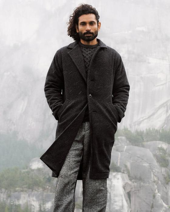 A man wearing Anián's Britannia wool coat