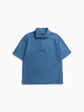 An Arpenteur short-sleeve piqué polo shirt in mid blue